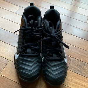 Youth Nike football cleats, size 5